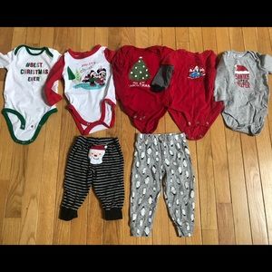 Lot of 6-9 months holiday onesies (5), pants (2)